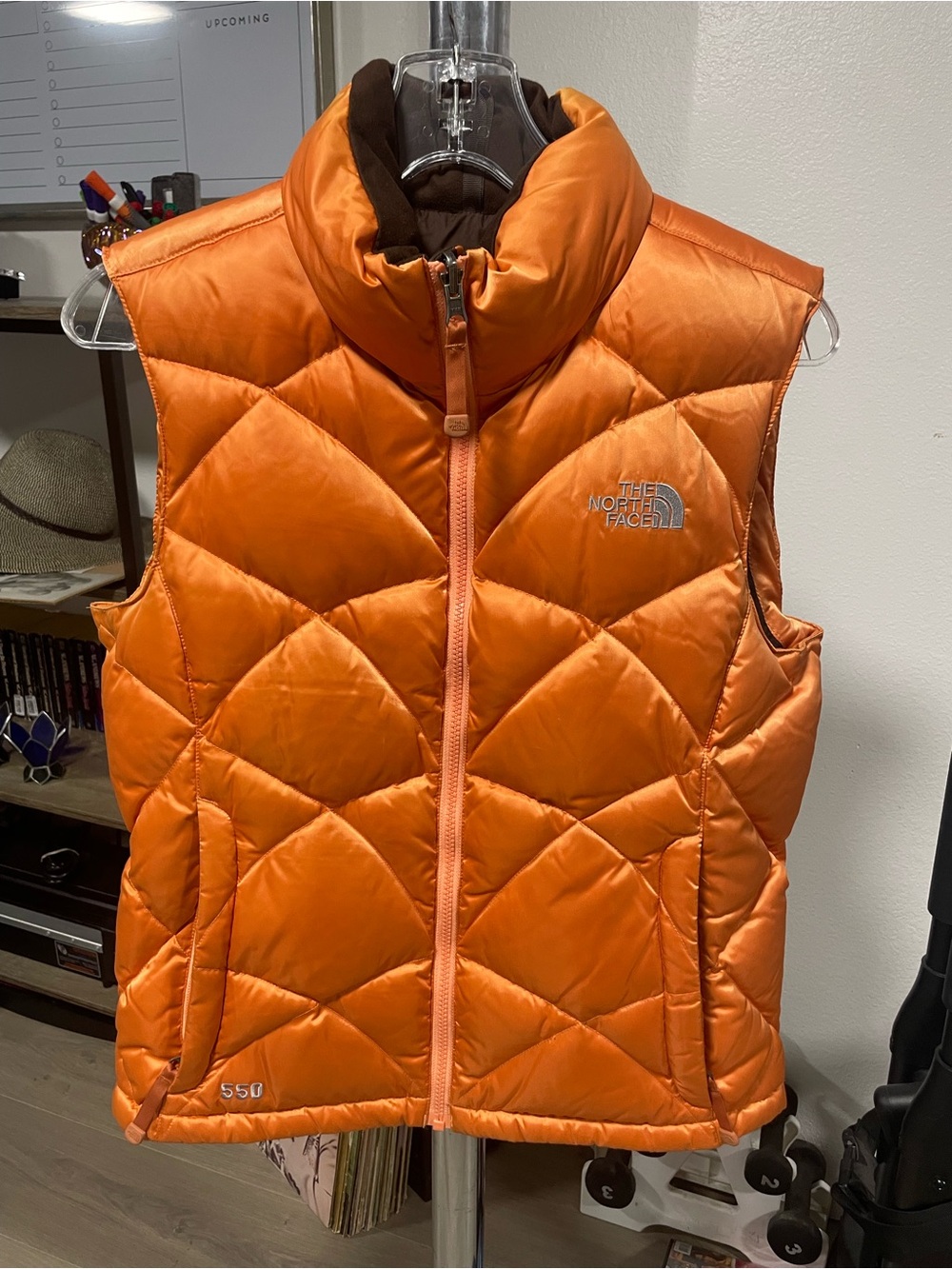 The North Face Orange quilted 550 insulated women's vest